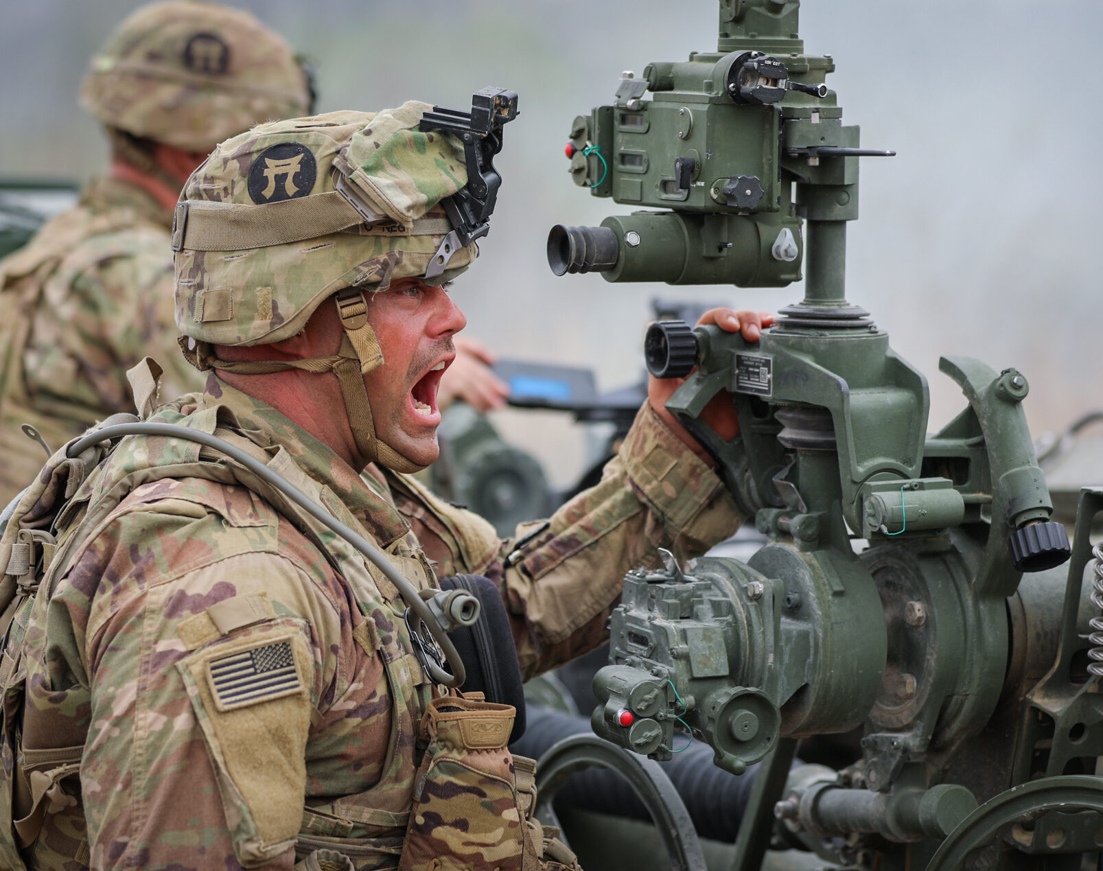 Sgt. Joseph Kammerer, a cannon crewmember with C Battery, 3rd Battalion, 320th Field Artillery Regiment, 3rd Brigade Combat Team, 101st Airborne Division (Air Assault), shouts commands during a direct fire live fire on a range at Fort Knox, KY April 25, 2022.